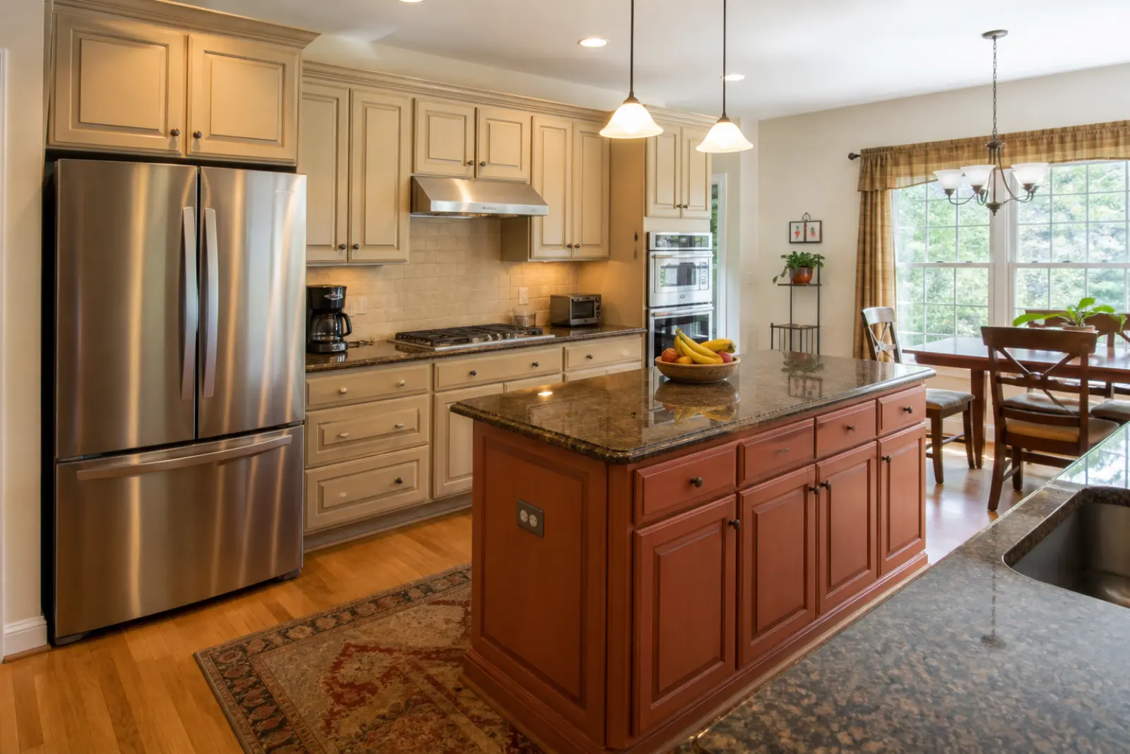 Suburban Leesburg kitchen with a French-door refrigerator